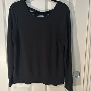 Loose fitting cross-back sweater